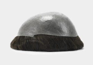 Close-up of a hair system base construction